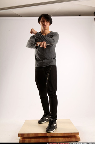 Man Young Athletic Fighting with knife Standing poses Casual Asian