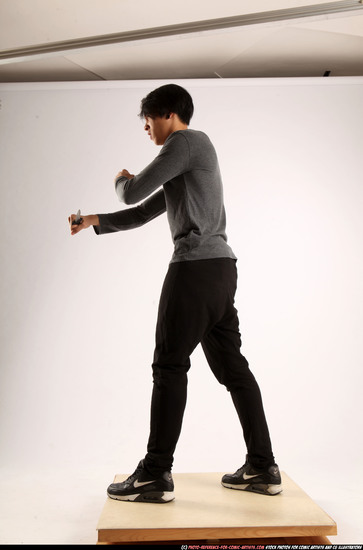 Man Young Athletic Fighting with knife Standing poses Casual Asian