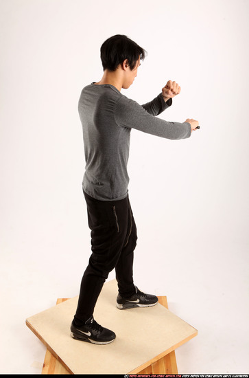 Man Young Athletic Fighting with knife Standing poses Casual Asian