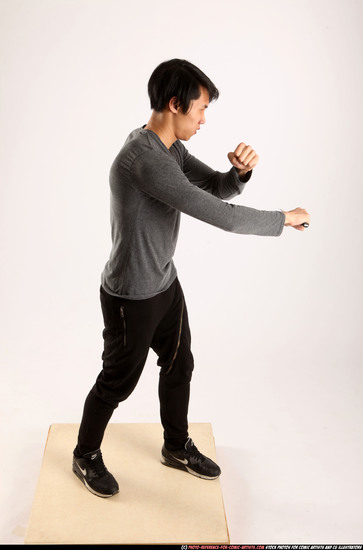 Man Young Athletic Fighting with knife Standing poses Casual Asian