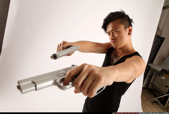 Man Young Athletic Fighting with gun Standing poses Casual Asian