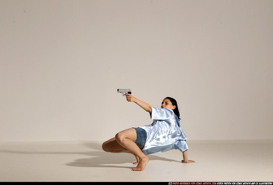 Woman Young Athletic White Fighting with gun Moving poses Casual