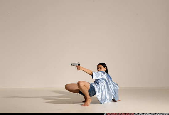 Woman Young Athletic White Fighting with gun Moving poses Casual