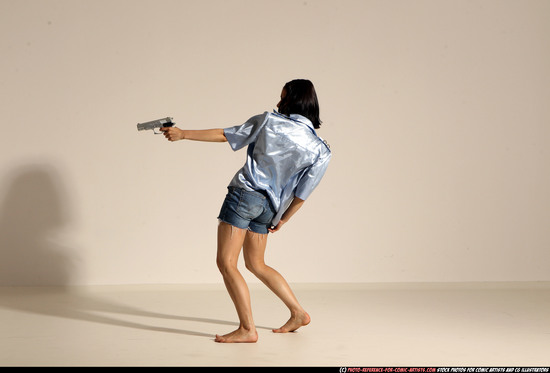 Woman Young Athletic White Fighting with gun Moving poses Casual