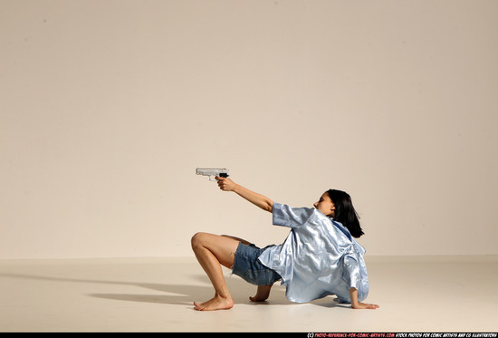 Woman Young Athletic White Fighting with gun Moving poses Casual