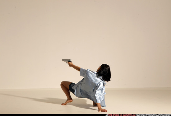 Woman Young Athletic White Fighting with gun Moving poses Casual