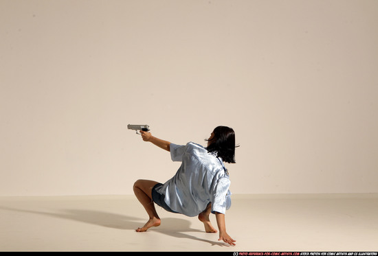 Woman Young Athletic White Fighting with gun Moving poses Casual