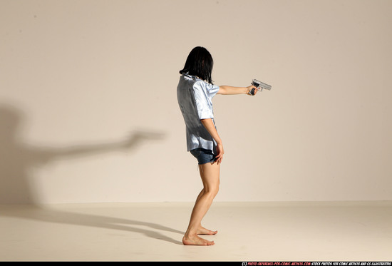 Woman Young Athletic White Fighting with gun Moving poses Casual