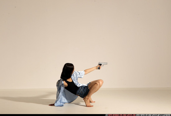 Woman Young Athletic White Fighting with gun Moving poses Casual