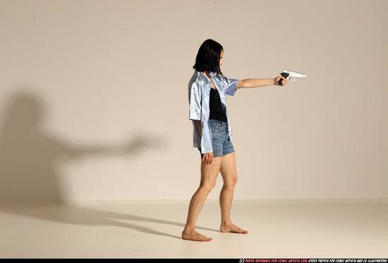 Woman Young Athletic White Fighting with gun Moving poses Casual