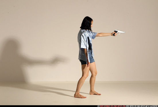 Woman Young Athletic White Fighting with gun Moving poses Casual