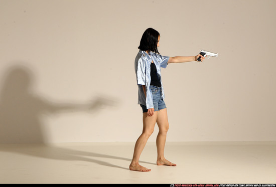 Woman Young Athletic White Fighting with gun Moving poses Casual