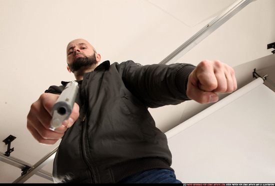 Man Adult Athletic White Fighting with gun Standing poses Jacket