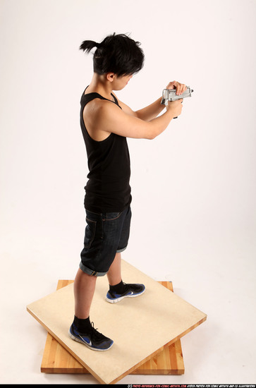 Man Young Athletic Fighting with submachine gun Standing poses Casual Asian