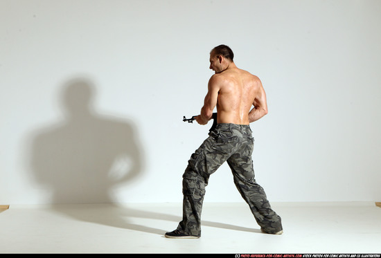 Man Adult Athletic White Fighting with submachine gun Moving poses Pants