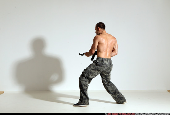 Man Adult Athletic White Fighting with submachine gun Moving poses Pants