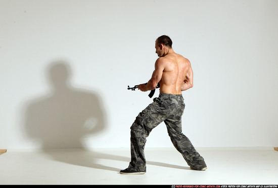 Man Adult Athletic White Fighting with submachine gun Moving poses Pants