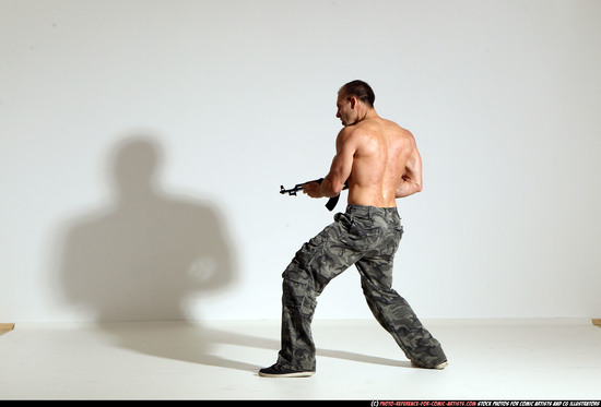 Man Adult Athletic White Fighting with submachine gun Moving poses Pants