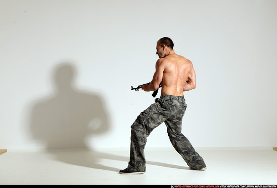 Man Adult Athletic White Fighting with submachine gun Moving poses Pants