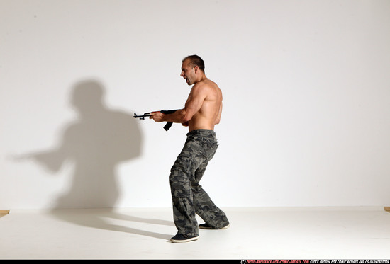 Man Adult Athletic White Fighting with submachine gun Moving poses Pants