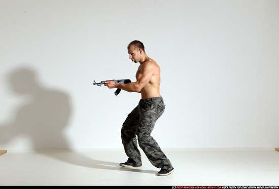 Man Adult Athletic White Fighting with submachine gun Moving poses Pants