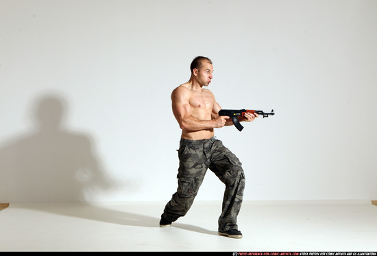 Man Adult Athletic White Fighting with submachine gun Moving poses Pants