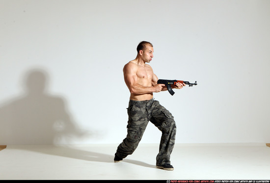 Man Adult Athletic White Fighting with submachine gun Moving poses Pants