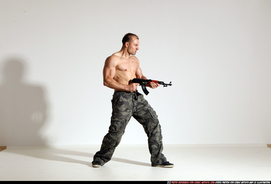 Man Adult Athletic White Fighting with submachine gun Moving poses Pants