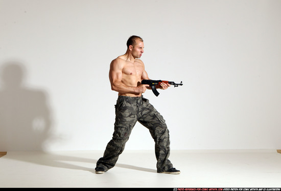 Man Adult Athletic White Fighting with submachine gun Moving poses Pants