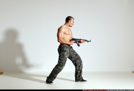 Man Adult Athletic White Fighting with submachine gun Moving poses Pants