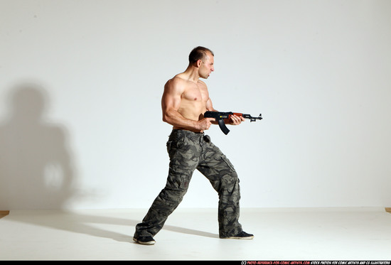 Man Adult Athletic White Fighting with submachine gun Moving poses Pants