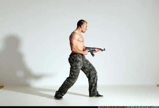 Man Adult Athletic White Fighting with submachine gun Moving poses Pants