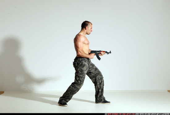 Man Adult Athletic White Fighting with submachine gun Moving poses Pants