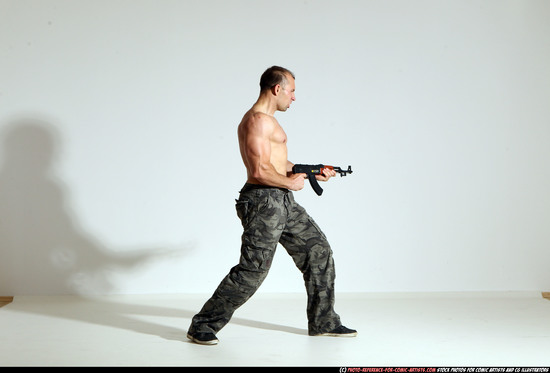 Man Adult Athletic White Fighting with submachine gun Moving poses Pants