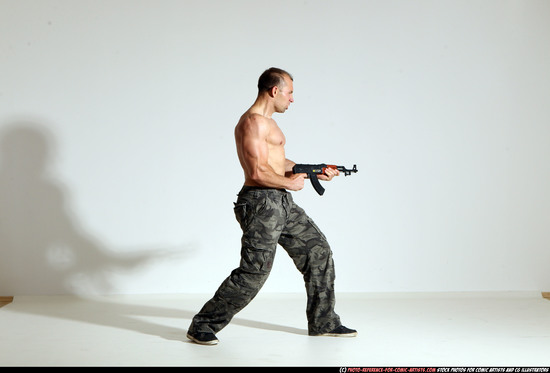 Man Adult Athletic White Fighting with submachine gun Moving poses Pants