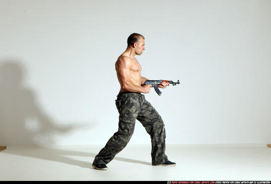 Man Adult Athletic White Fighting with submachine gun Moving poses Pants