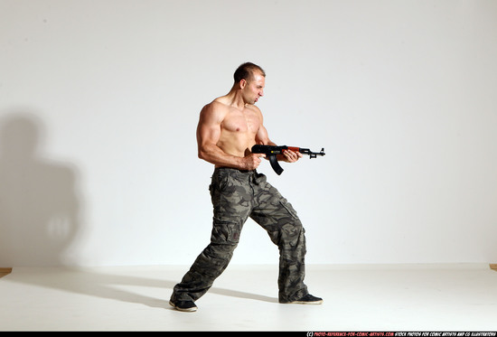 Man Adult Athletic White Fighting with submachine gun Moving poses Pants