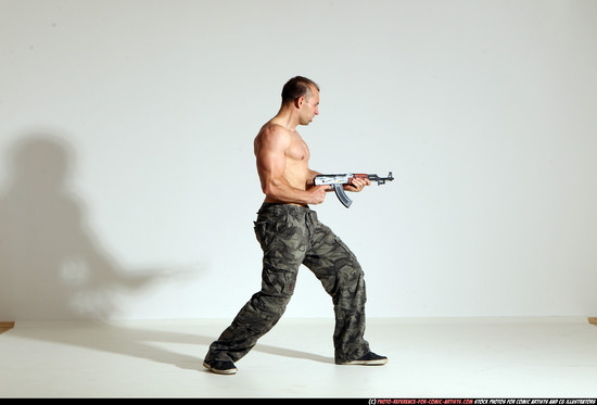 Man Adult Athletic White Fighting with submachine gun Moving poses Pants