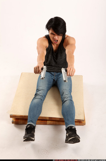 Man Young Athletic Fighting with gun Sitting poses Casual Latino