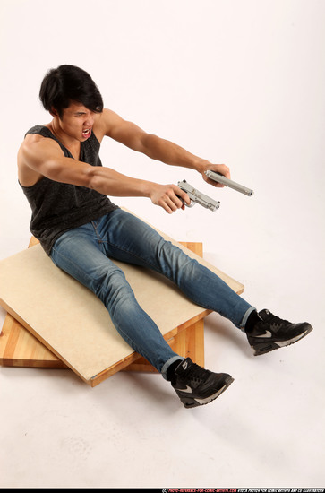 Man Young Athletic Fighting with gun Sitting poses Casual Latino