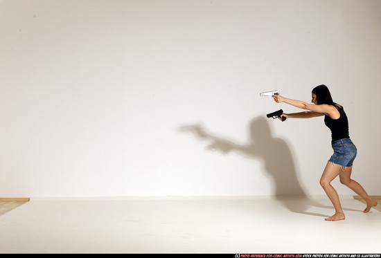 Woman Young Athletic White Fighting with gun Moving poses Casual