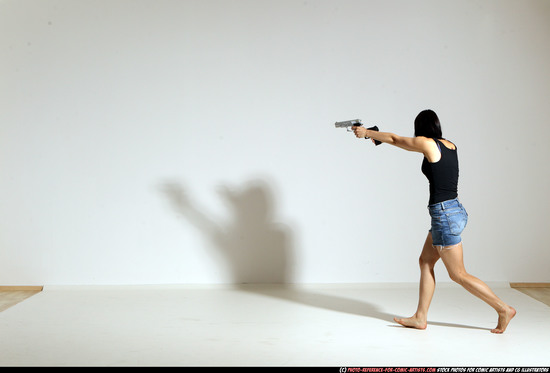 Woman Young Athletic White Fighting with gun Moving poses Casual