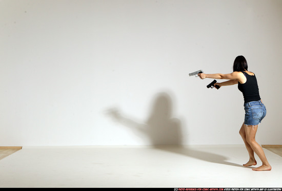 Woman Young Athletic White Fighting with gun Moving poses Casual