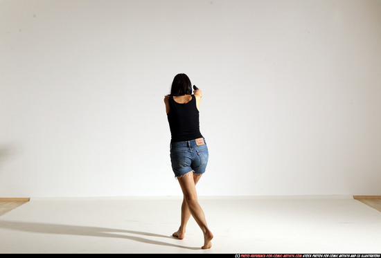 Woman Young Athletic White Fighting with gun Moving poses Casual