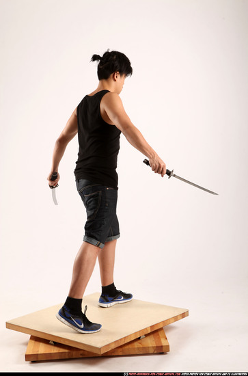 Man Young Athletic Fighting with sword Standing poses Casual Asian