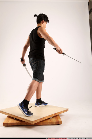 Man Young Athletic Fighting with sword Standing poses Casual Asian