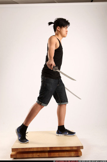 Man Young Athletic Fighting with sword Standing poses Casual Asian