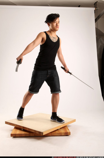 Man Young Athletic Fighting with sword Standing poses Casual Asian