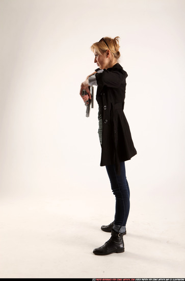 Woman Adult Athletic White Fighting with gun Standing poses Coat