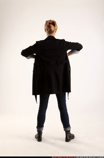 Woman Adult Athletic White Fighting with gun Standing poses Coat